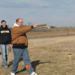 bud_dh_playing_kubb My brother and hubby