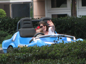 Me and my niece in the race car - she's steering, I'm pushing the gas pedal!