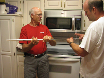 Dad and Hubby making it work! Look at the soap coming out!